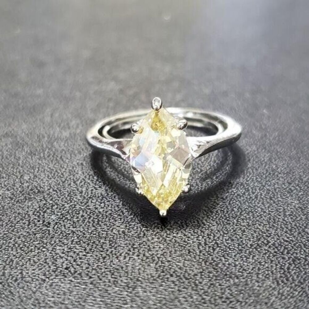 Avon silver tone yellow CZ ring size 7.5